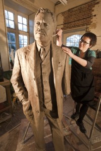 Hazel Reeves sculpting the monumental Sir Nigel Gresley in her studio (photo by Roger Bamber)