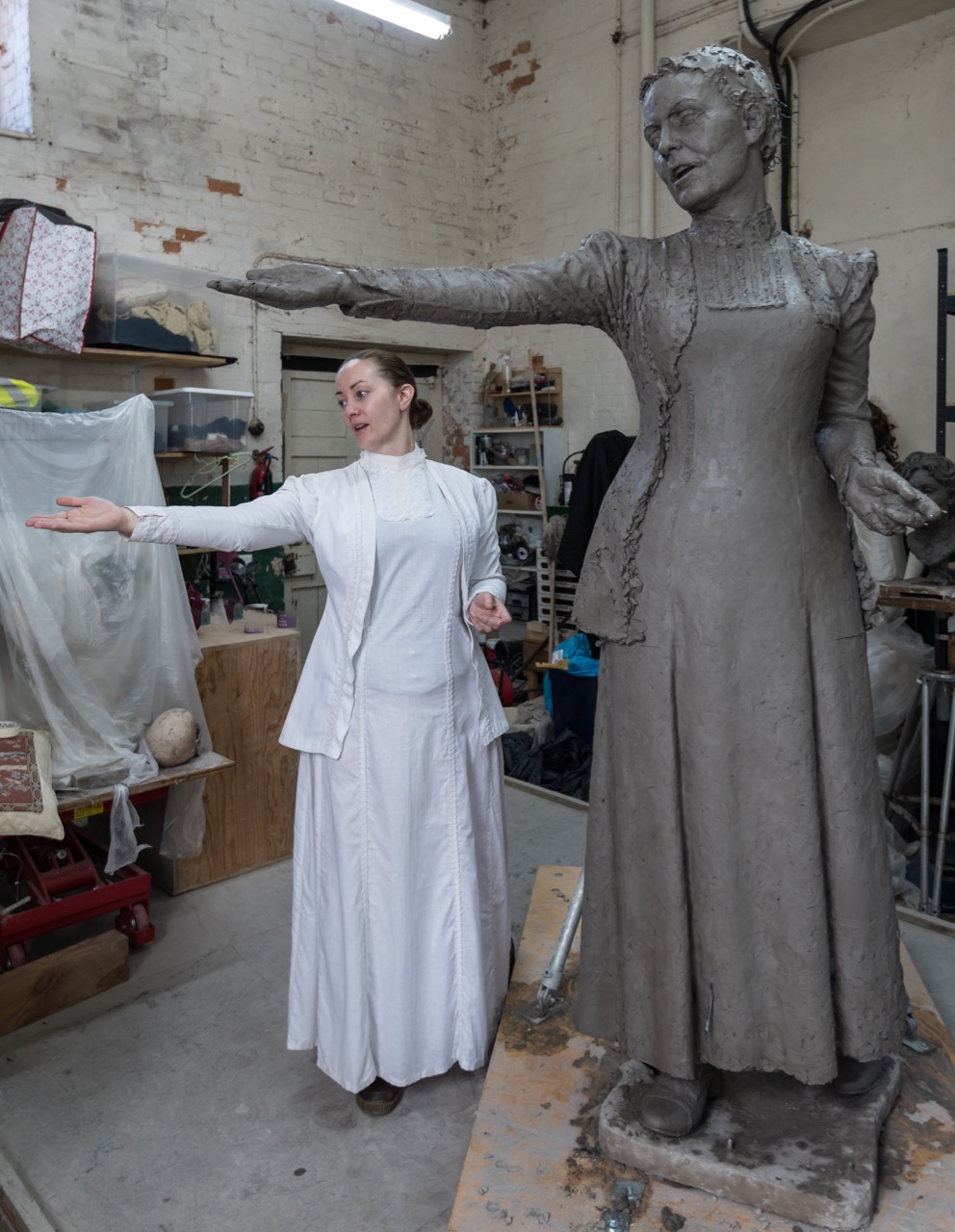 Sarah Jenkins with the Emmeline Pankhurst statue - photo by Nigel Kingston
