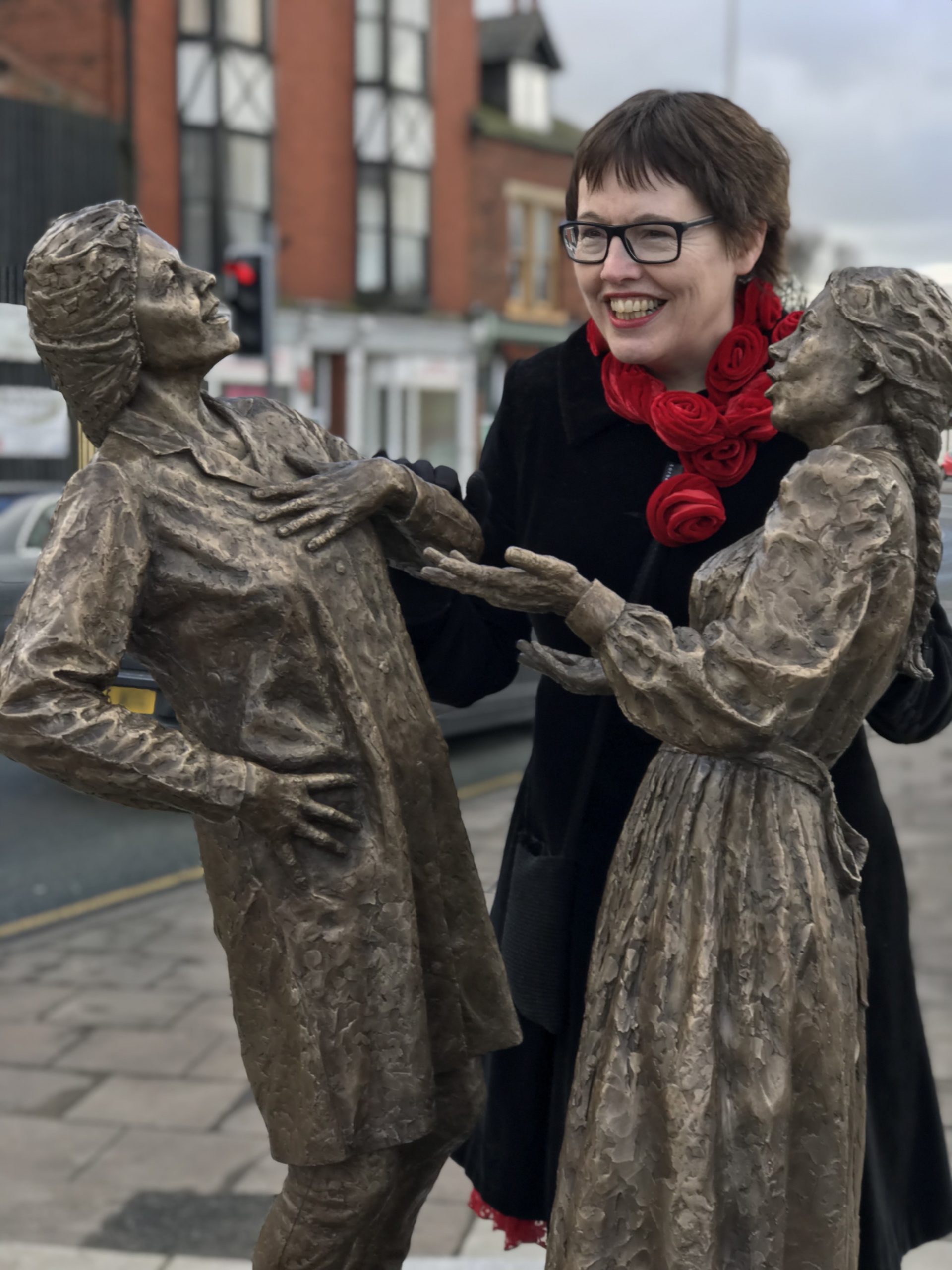 Sculptor Hazel Reeves with the two bronze Cracker Packers