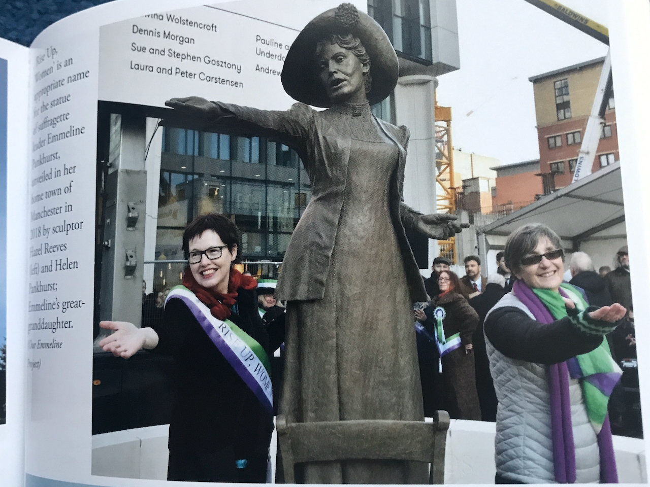 Helen Pankhurst and Hazel Reeves pose in front of the Our Emmeline statue
