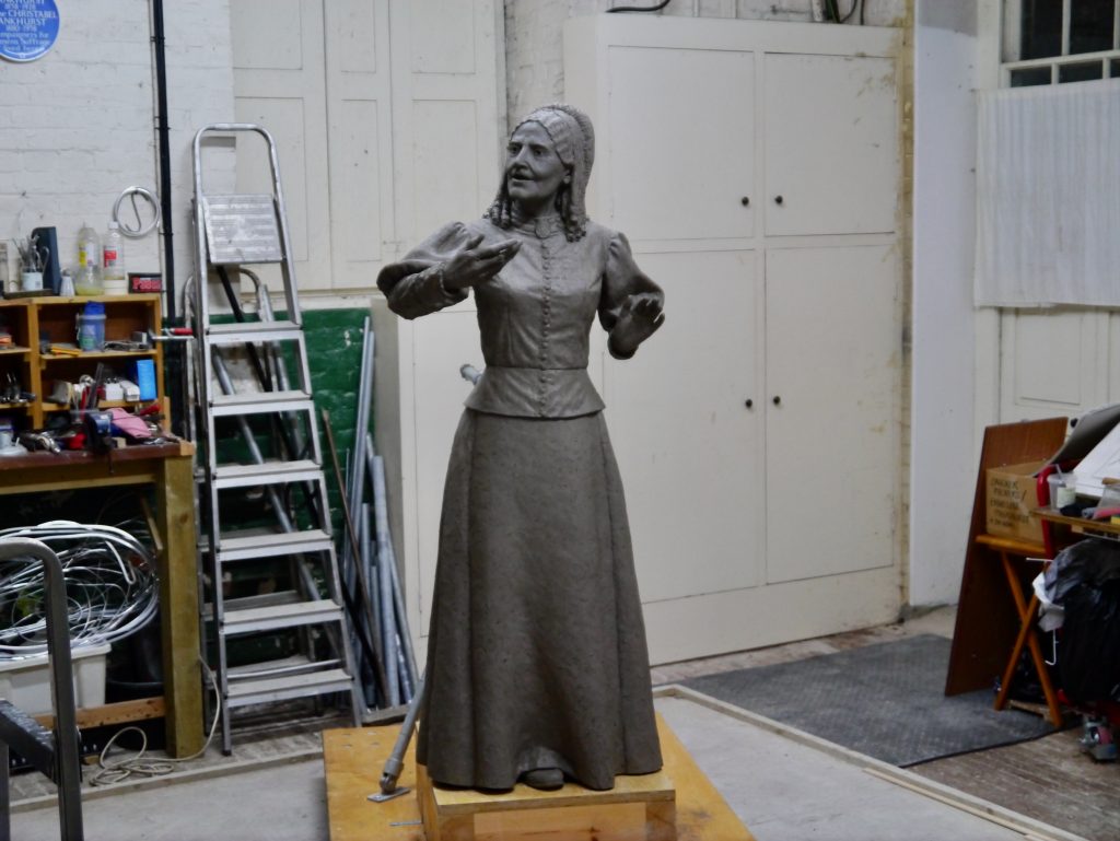 The clay statue of Elizabeth Wolstenholme Elmy in the artist's studio
